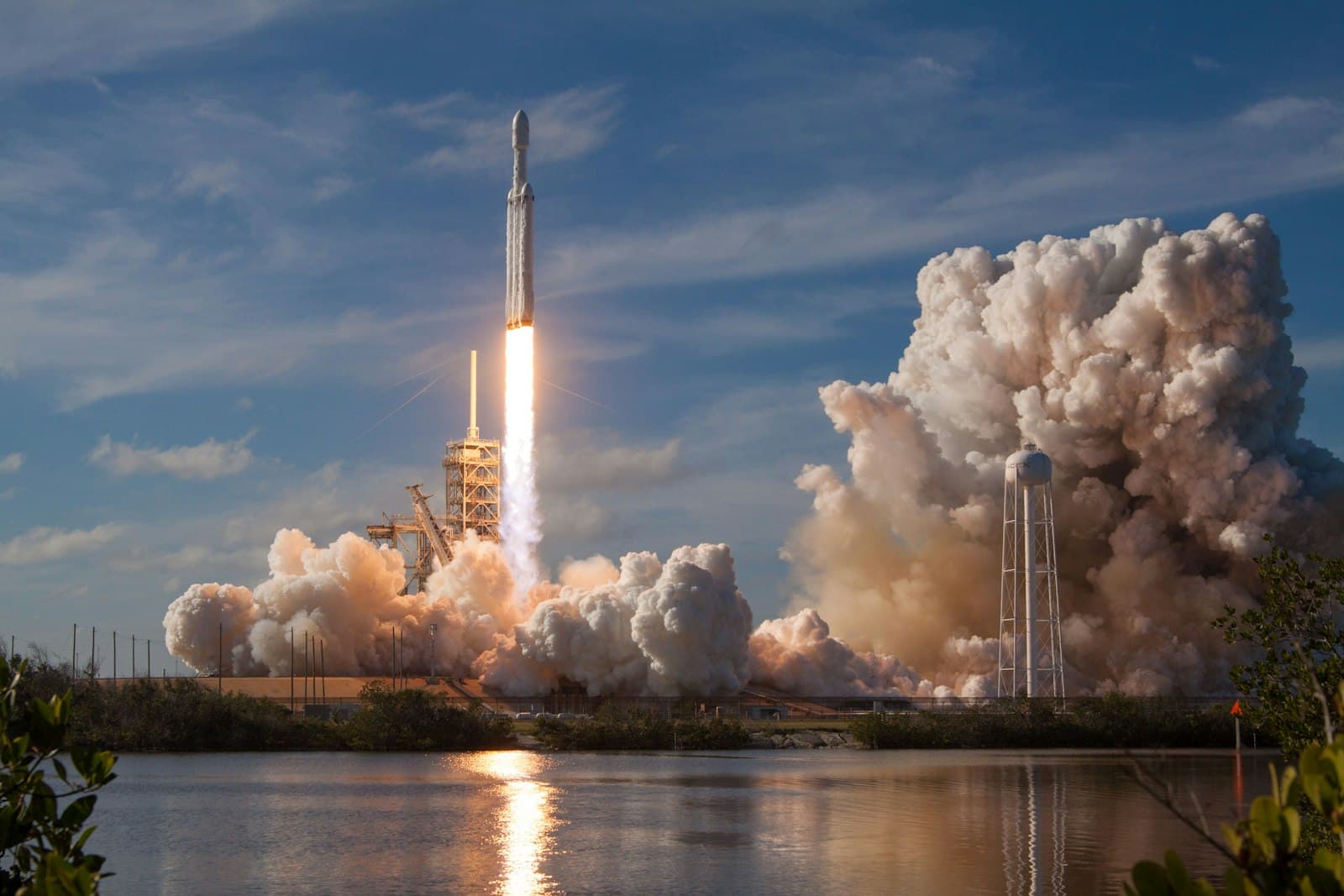 Falcon Heavy rocket lifting off from the launch pad